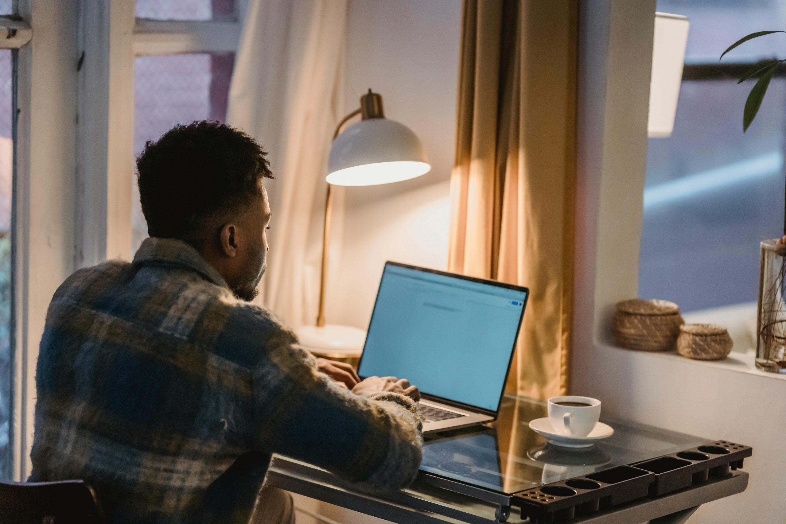 Affiliate marketer working on laptop from home office